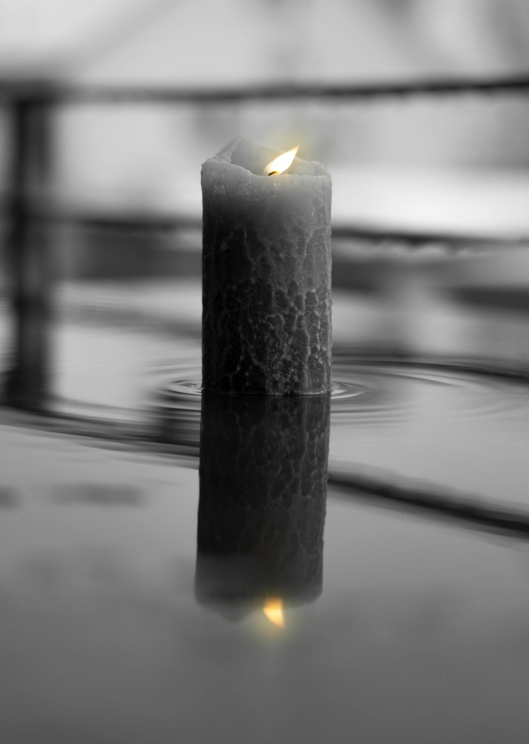 Lighted Candle in Grayscale Photography