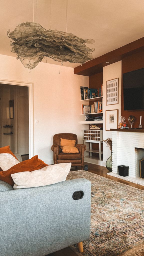 Warm inviting living room with modern decor and natural lighting.
